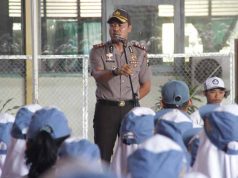 Dorong bela negara, polisi aktif terlibat upacara di sekolah
